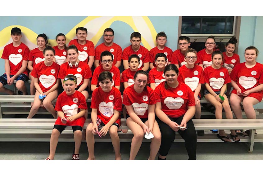 Poseidon’s 2019 Swim for Hope participants, first row, from left, Isaiah Coombs, Kaden Slade, Kaitlyn Hall, Claire Harvey; second row, Mackenzie Sutton, Jorja Bennett, Jack O’Driscoll, Noah Biffin, Alex Noel, Parker Lynch, Rhiannon Sellars, Sophie Fortune; third row, Noah Coombs, Rylee Moores, Aby Trask, Colby Sharpe, Evan Adcock, Mason Neil, Jayden Pike, Daniel Drake, Julia Verge and Kendra Slade. Missing from the photo are Ciara O’Keefe and Mya Cole.