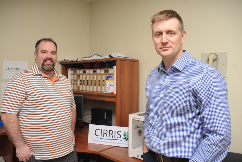 Registered nurse Paul Norman, left, and Dr. Chris Patey see a lot of potential in a new non-profit venture operating out of Carbonear General Hospital dedicated to research in rural health care.