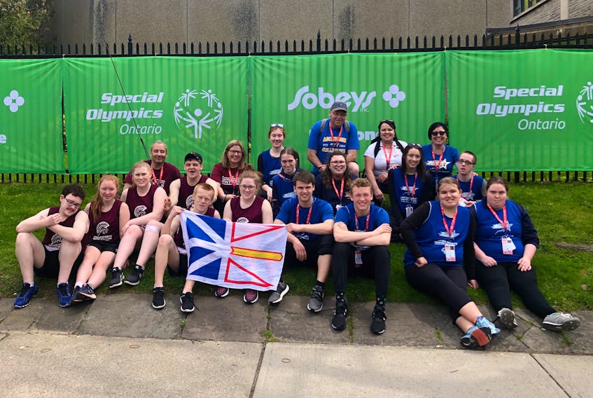 Two high schools from Conception Bay North represented Newfoundland and Labrador at the 2019 Special Olympics Ontario Invitational Youth Games, the first international competition held in Canada focusing on unified sport. Front row, from left, Steven Riddle-Ellsworth and Mackenzie Curran (holding the Newfoundland and Labrador flag), Eric Ardis, Ryan Neil, Rhegan Robinson and Kayleigh Flynn. Second row, Joshua Curran, Hannah Doyle, Ally Cleary, Luke Mullins, Chelsea Parsons, Brittany Anne Hutchings, Jadyn Jacobs and Dawson Crane. Third row, Rodney Hodder, Danielle Doyle, Sarah Lambe, Mark Shortall, Bonnie Parsons and Sonya Lee. Missing from the photo are Jayden Fiddler and Neil Kearley.