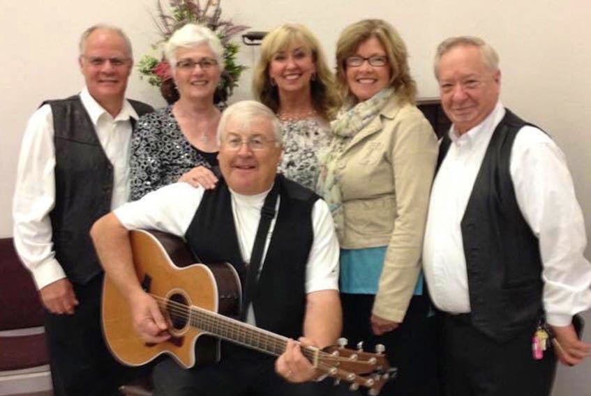 Dino and the Harmonies take a break from rehearsing for their final Christmas shows on Nov. 26 and 27. From left are Brian Knox, Judy Lowe, Dunsford, Rita Watts, Keila Glydon and Heartz Godkin. SUBMITTED PHOTO