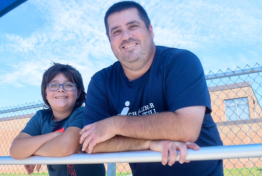 Randy Crouse and his son Gehrig play key roles with the Challenger Baseball program in Antigonish. Randy is the program’s local, provincial and national co-ordinator, while Gehrig is a ‘buddy’ who assists players during games.