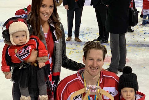 Alex Grant of Team Canada celebrated the Spengler Cup championship with his wife, Nancy, another Antigonish native, and their children – three-year-old son, Cooper, and 10-month-old daughter, Darcy. CONTRIBUTED