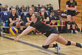 Grade 12 Keisha Gillis of the Inverness Academy Rebels dives for a sensational dig in the championship match win over Hants North Flames. Corey LeBlanc
