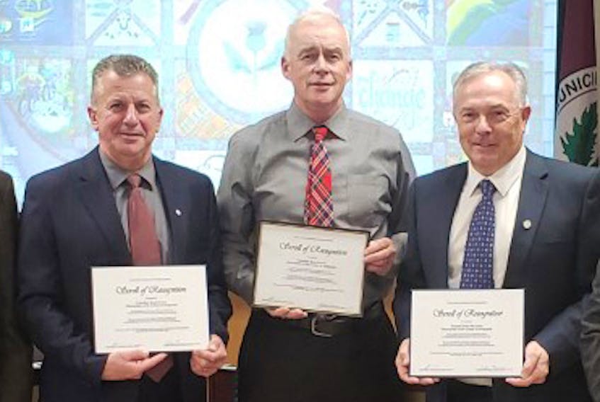 During the Municipality of the County of Antigonish monthly meeting Nov. 19, three councillors were recognized for receiving long-service certificates during the recent Nova Scotia Federation of Municipalities (NSFM) fall conference in Halifax. Warden Owen McCarron (right) was honoured for 25 years, while Councillors Rémi Deveau (left) and Bill MacFarlane have reached 15. CONTRIBUTED