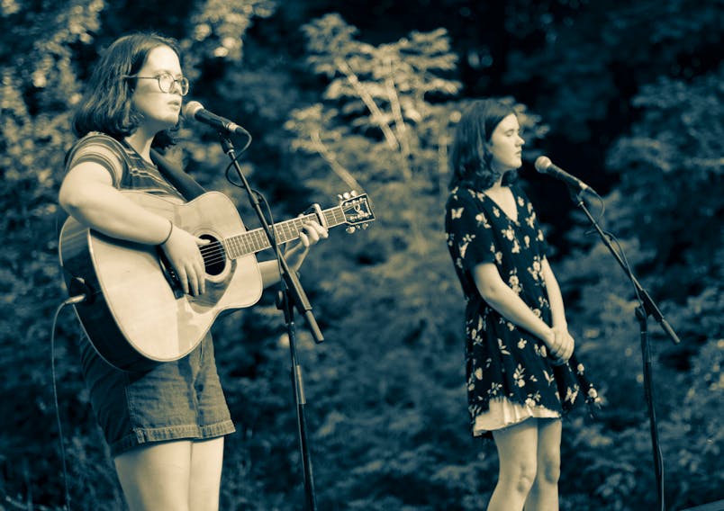 Sisters Moira and Claire MacMillan, shown during one of their on-stage performances, recently released "No Snow", their third single. They call it a “quirky Christmas tune.” CONTRIBUTED