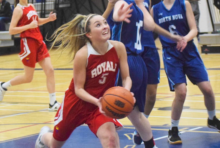 Emily MacDonald of the Dr. John Hugh Gillis Regional Royals drives to the basket in action against the North Nova Gryphons Nov. 20 in New Glasgow. The Gryphons won 72-52. The Royals will host the Mabel Arsenault Memorial this weekend at the Regional gym. Kevin Adshade/THE NEWS