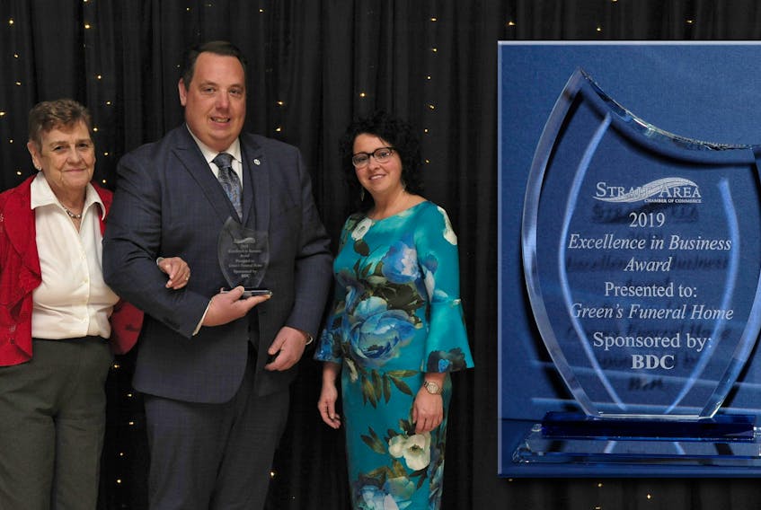 Strait Area Chamber of Commerce president Diana Martell (right) presented the Excellence in Business Award to Green’s Funeral Home on Bernard Street in Port Hawkesbury, which was represented by Catherine Cogswell and John Green. CONTRIBUTED