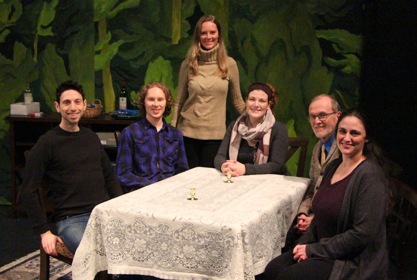 Director Kailin Wright (standing) and the cast of Late Company, including Max Toulch (Bill), Tyler Kingston (Curtis), Ashley Sheppard (Debora), Ken Kingston (Michael) and Briana Lynch-Rankin (Tamara), gather for an onstage photo at St. F.X.’s Bauer Theatre during a recent rehearsal for the upcoming Theatre Antigonish production. Corey LeBlanc