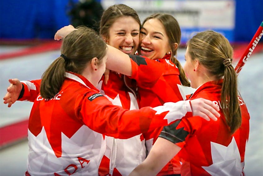 Team Canada celebrates after defeating Sweden 7-4 to capture gold at the World Junior Women’s Curling championship Saturday morning in Aberdeen, Scotland. From left, third Kristin Clarke, skip Kaitlyn Jones, second Karlee Burgess of Hilden and lead Lindsey Burgess of Truro.