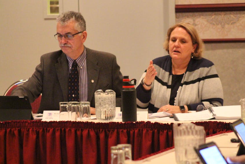 Completing one of 36 recommendations from the external review of Central Health, the health authority has opened up board of trustees meetings to the public. Pictured, Don Sturge, board chair, and Andrée Robichaud, Central Health CEO, attend the second of 10 public meetings for the region in Gander, Jan. 23.
