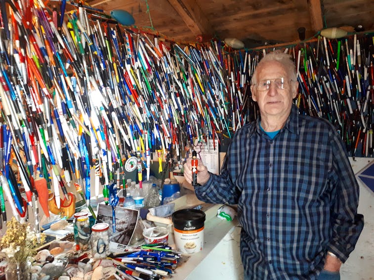 What started as a way of keeping track of visitors to his fishing stage/unofficial museum in Durrell has led to collection of several thousand pens for Melvin Horwood. ADAM RANDELL/THE CENTRAL VOICE