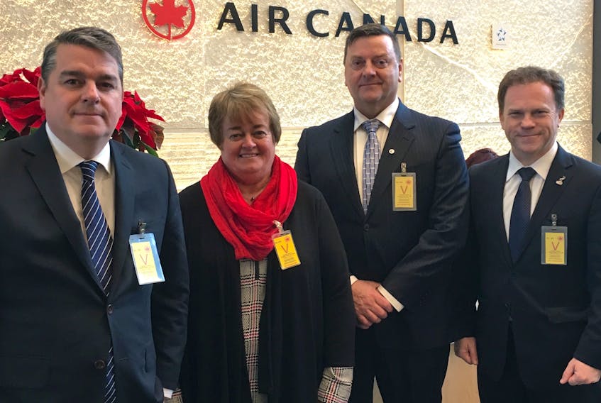 A Gander contingent met with Air Canada officials on Monday, Dec. 10, to make its case for the reinstatement of a two-flight per day winter schedule from Gander to Halifax. Pictured, from left, are Gander International Airport president and CEO Reg. Wright, Gander and Area Chamber of Commerce president and CEO Hazel Bishop, Gander Mayor Percy Farwell, and Coast of Bays – Central – Notre Dame Bay MP Scott Simms.