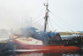 Sideview of the boat, Sebastian Sails, burned by the fire.