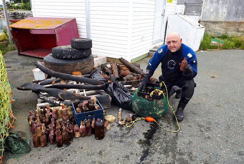 An example of some of the bottles, tires and other garbage Shawn Bath has been clearing from beaches in the province. He hopes the Clean Harbours Initiative will grow in time with a boat, more diving gear and volunteer divers.