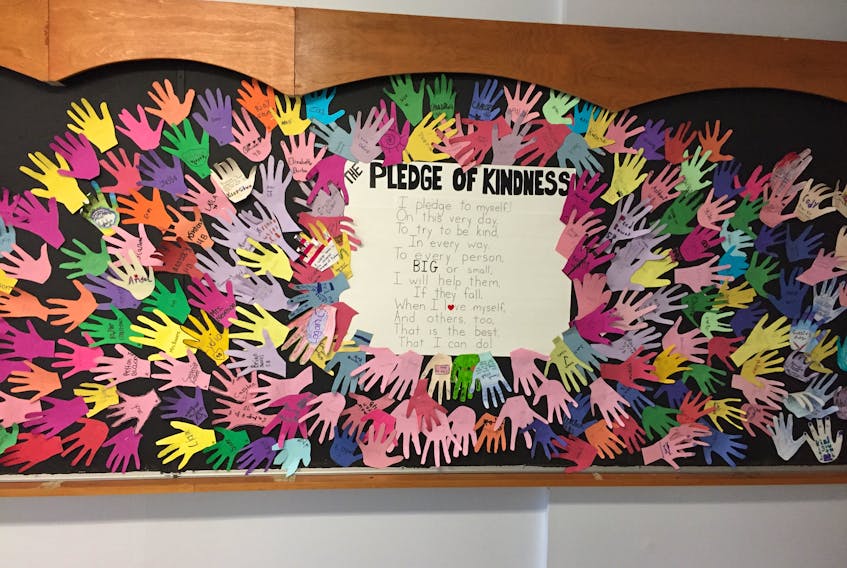 Every hand marks a random act of kindness carried out by students in Springdale.