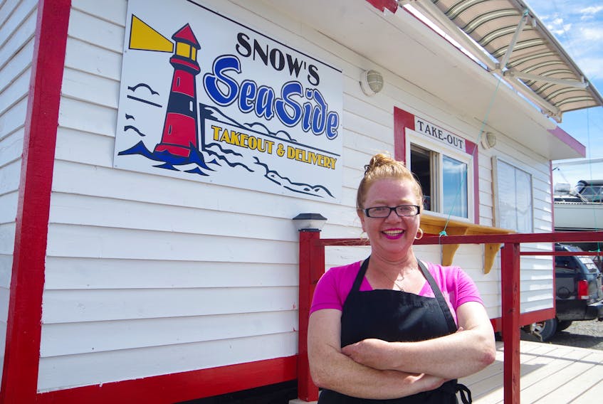 Denise Snow at her seaside business in Lewisporte.