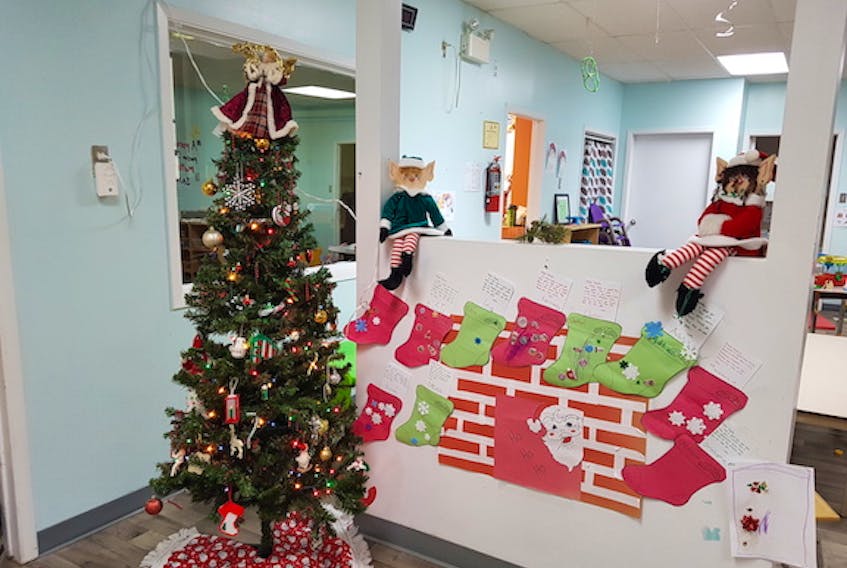 Kids at the New Fun Land 2 Daycare on the Springdale College Campus helped to decorate for the season.