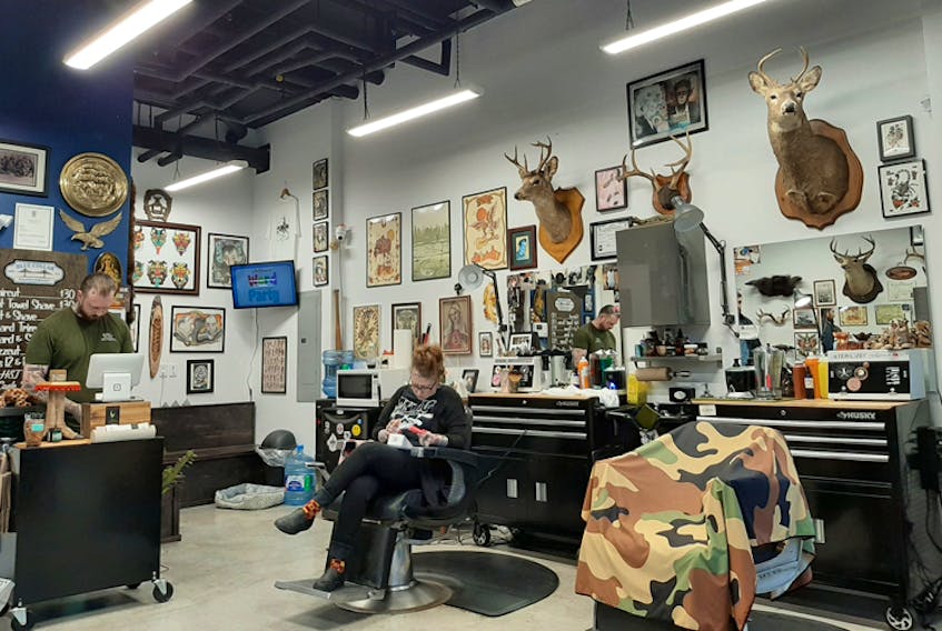 Mirroring its husband and wife co-owners, the Blue Collar Barbershop is eclectic, non-traditional, retro and modern at the same time.