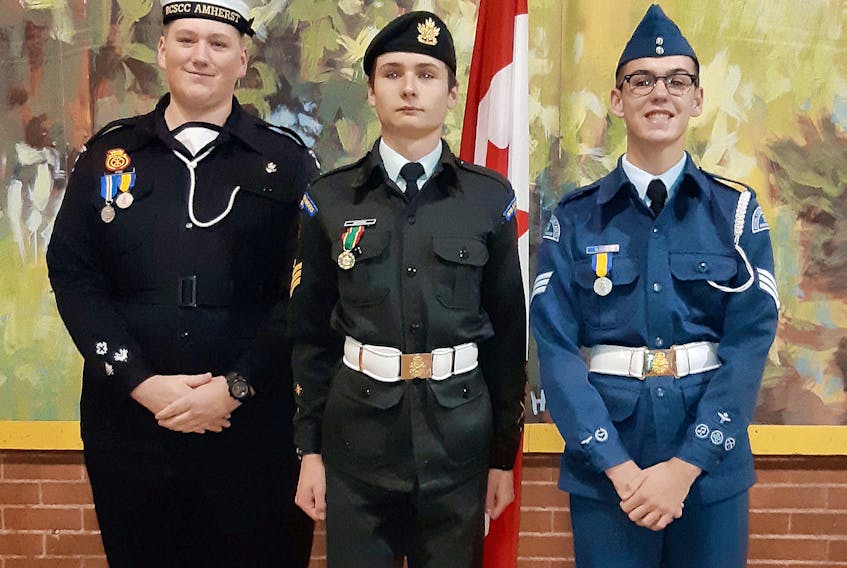 (From left) Tyler Rowe of the sea cadets, Morgan White of the army cadets and Braeden Lines of the air cadets are prepared to celebrate Cadet Day on Saturday.