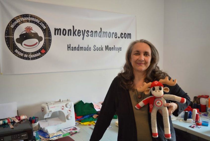 Sherrie Kearney, owner of monkeysandmore.com, holds a specially made custom Canada 150 sock monkey. The online business was granted permission to make special sock mooses and monkeys for the 150th anniversary of Canada in 2017.