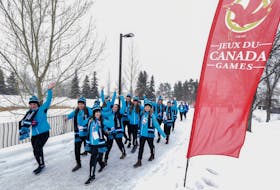 Members of the Nova Scotia ringette team make their way to the Centrium in Red Deer, Alta., for the opening ceremonies Friday at the Canada Winter Games. Competition begins Saturday, with table tennis, speed skating, ringette and boys’ hockey scheduled.