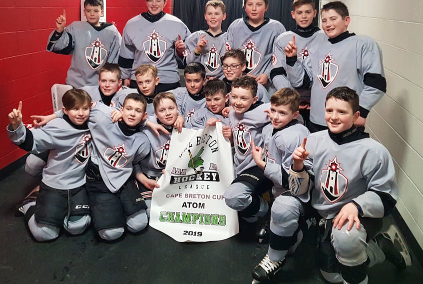 The Cape Breton West Islanders captured the Cape Breton Cup atom ‘AA’ championship with a 5-2 win over the Cape Breton County Islanders in the championship game on March 3 at the Membertou Sport and Wellness Centre. Cape Breton West also finished first overall in league play. They will face the Truro Bearcats for the provincial title at Hockey Nova Scotia’s Day of Champions event on April 13 in Truro. Front row, from left, are Liam Taylor, Cole MacNeil, Carson MacEachern, Donald Gillis, Owen Campbell, Aiden MacDonald and Kieran MacDonald. Middle row, from left, are Merrick MacLellan, Lance Heukshorst, Sam Trenholm and Mathieu Delaney. Back row, from left, are Leo Forance, Jake Poirier, Reid MacDonald, Angus Hughie MacLean, Olan van Zutphen, Brady MacKinnon. Missing are coaches Brent MacEachern, Wayne MacDonald, Sheldon MacDonald and Lawerance MacLellan.