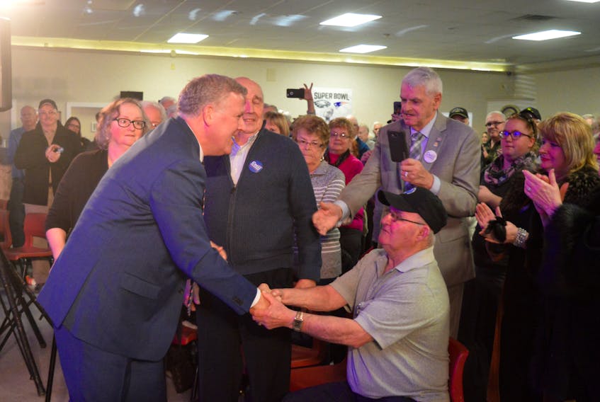 Cecil Clarke shakes the hand of a supporter after announcing his decision to throw his name in the ring for the PC leadership. Clarke made his announcement on Saturday.