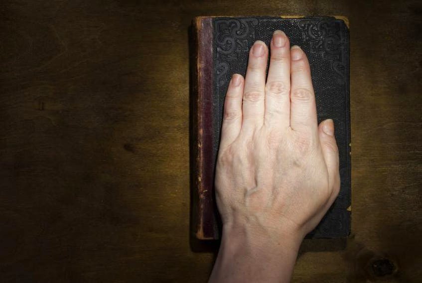 A hand on a bible, for Bill Kilfoil peice.