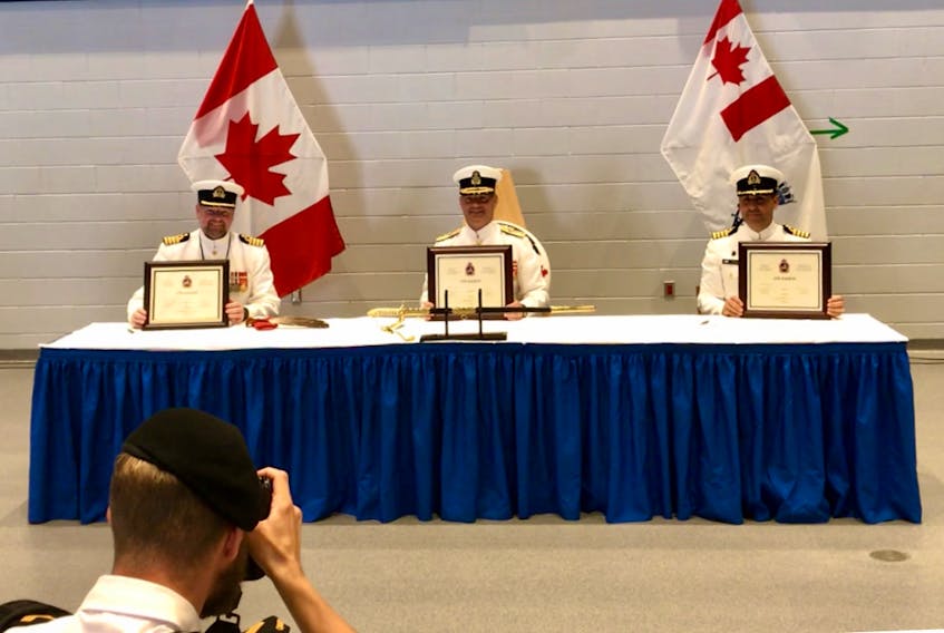 From left: outgoing CFB Halifax base commander, Capt. (Navy) David Mazur; commander of Maritime Forces Atlantic/Joint Task Force Atlantic, Rear-Admiral Brian Santarpia; and incoming CFB Halifax base commander, Capt. (Navy) Sean Williams. - Contributed
