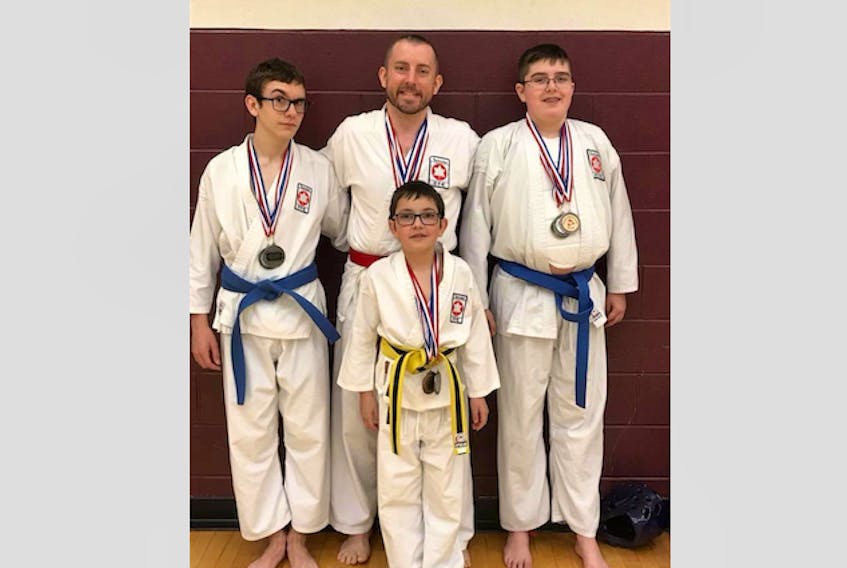 Members of Shoto Ryu Jutsu Karate in Yarmouth won medals in Charlottetown. In front: Austin Ellis. In back (from left): Michael Feener, Matthew Ellis, Ryder Lusk. A fifth representative of the local club – Rob Sweeney – went to the P.E.I. event as an official.