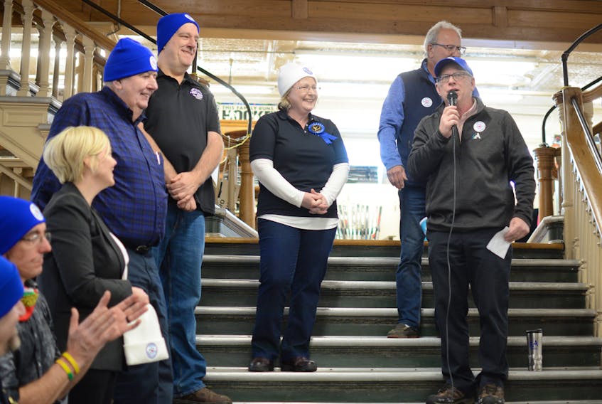 After Sheila Christie, centre, was crowned chili champion for the third straight year, town of Amherst recreation director Bill Schurman asked her what her secret ingredient was.
