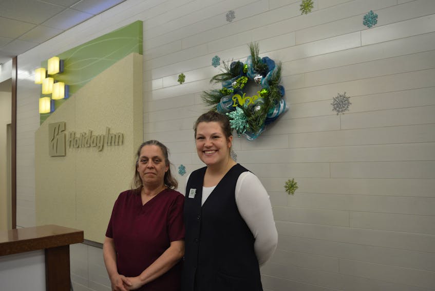From left to right, Linda Sivret and Mary Frances Boudreau, employees at the Holiday Inn in Sydney are shown during their shift on Christmas day. CHRISTIAN ROACH/CAPE BRETON POST