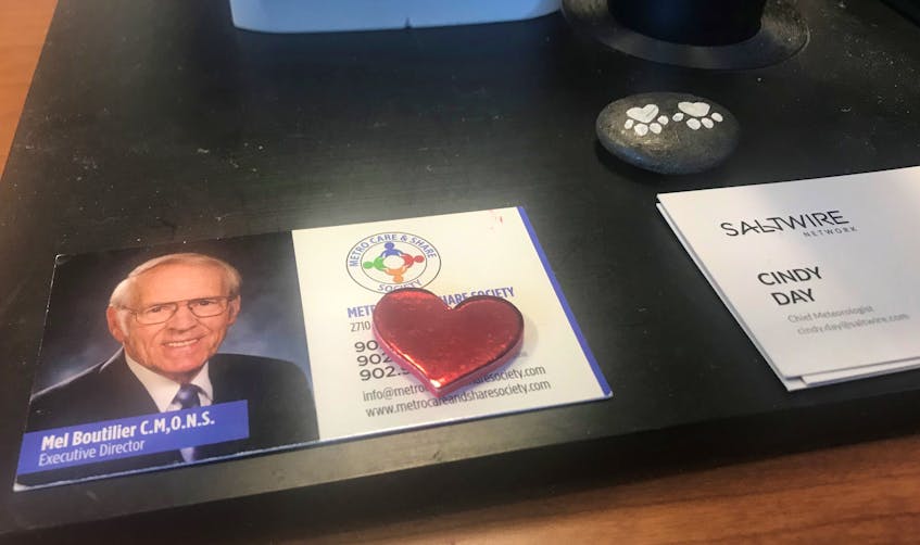 I keep Mel Boutilier’s business card on my desk.  When I feel like I am being pulled in all directions, Mel’s eyes remind me that inner peace comes from helping others.
