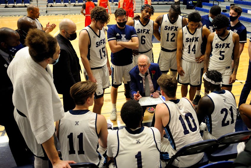Steve Konchalski discusses a play with the St. Francis Xavier X-Men during the inaugural ‘Coach K Challenge’ exhibition game versus the Acadia Axemen on Saturday night in Antigonish. - Bryan Kennedy / St. F.X. Athletics