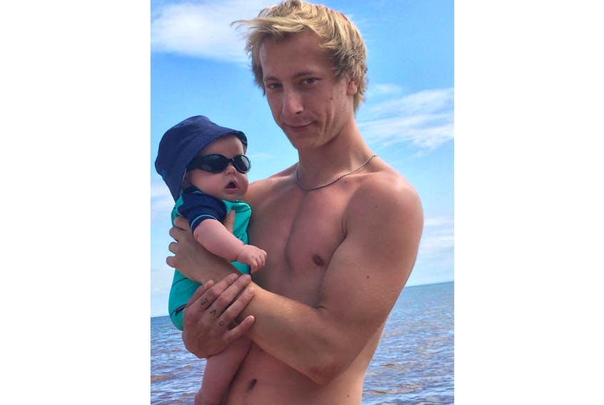 Cody Robert MacLean, pictured with his son Lennon.