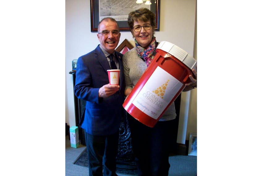 Charlottetown Mayor Phillip Brown and Cheryl Millman, Open Door Outreach executive director, launch the 2019 Coins for Christmas campaign.