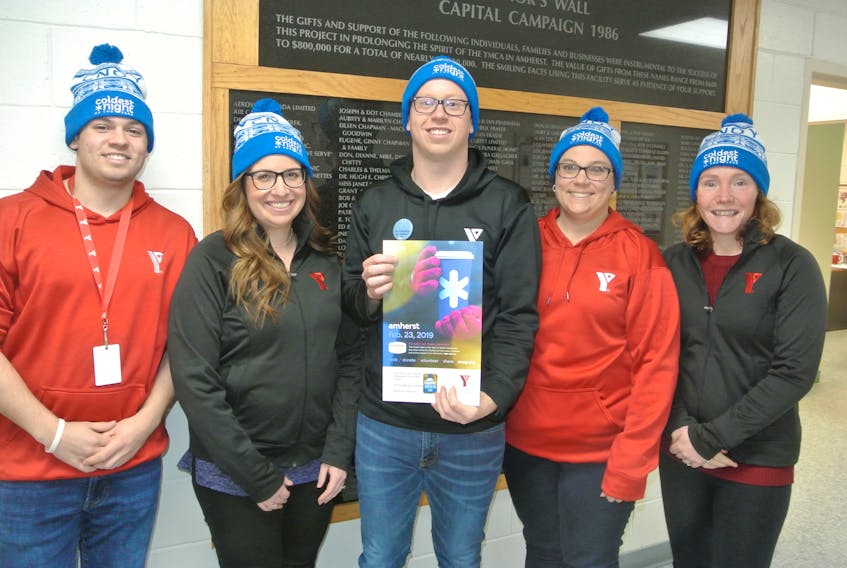 The Cumberland YMCA is hosting a Coldest Night of the Year walk on Feb. 23 in support of its homelessness support and outreach program that assists people who are homeless and/or living in poverty. Teams, ideally, of four to 10 people will be invited to walk a five-kilometre course through Amherst, ending at the YMCA for refreshemnts. (From left) YMCA officials including membership services representative Landen Clarke, membership and administration manager Heather Gallant, development coordinator Jeff MacNeil, CEO Trina Clarke and homelessness support and outreach coordinator Alison Lair look over a copy of the Coldest Night of the Year poster.