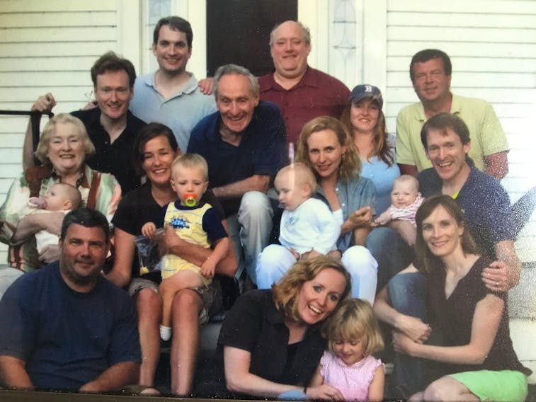 The O'Briens are shown in a family photo. At the far left, wearing a dark black shirt, is late-night TV host and comedian Conan O'Brien. Sandra Howard/Special to The Guardian