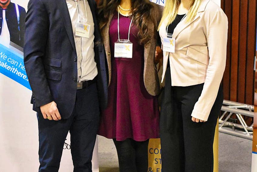 Matthew Berrigan from ESREN’s Connector Program (left), Margaret Schwartz from the Department of Labour and Advanced Education, and Kelsey Bowman, a third-year finance student at St. F.X., gather during the Connect @ X event last month.