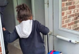A child walking into a new home in Halifax. Adsum Women & Children is launching a new project called Unlocking Hope, to help women and families find housing and move away from domestic violence and toward stability and self-determination.