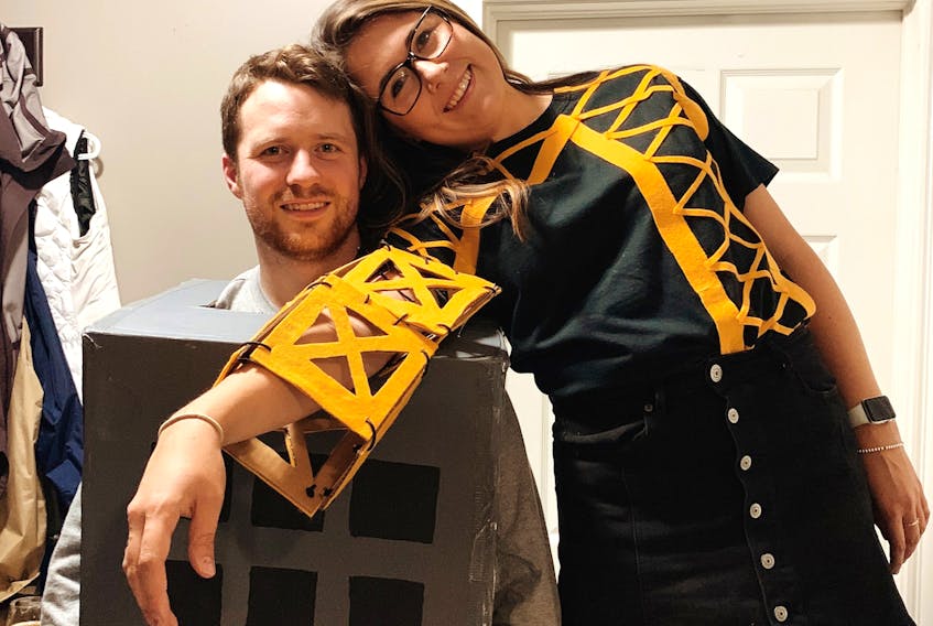 Nicole Bell and her partner Adam Higdon in their crane Halloween costumes. -ALEX PEDDLE - Contributed