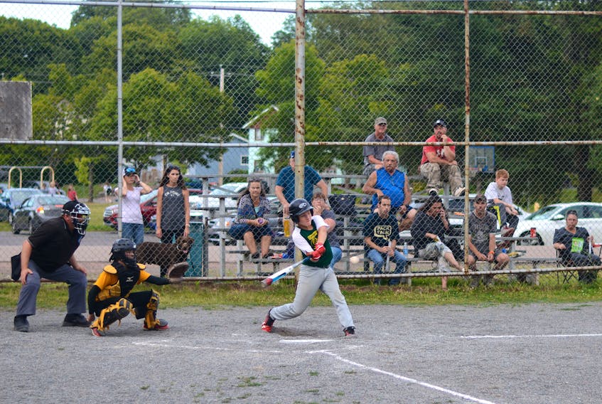 Connor Hunter of the Carter’s Cresting Cubs swings away in Amherst Little League championship series action on Monday against the Lions. The Cubs rallied twice to win the opening game of the best-of-three final 5-4.