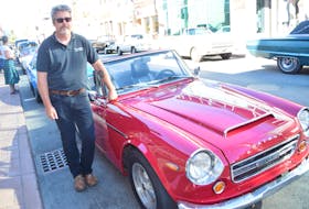 Damian Hill with his 1969 Datsun convertible.