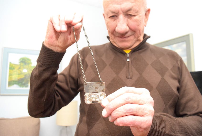 Frank LeBlanc, a member of the Air Force Club in Truro is hoping to hear from someone who can identify the person belonging to military dog tags discovered in a Masstown garden.