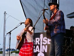 Maritime songwriters Jessica Rhaye and Dave Gunning perform together on the mainstage at the 2015 Stan Rogers Folk Festival. On Wednesday, organizers of the annual event that brings thousands of music fans to Canso each summer announced they were canceling the 2020 edition due to COVID-19 concerns.