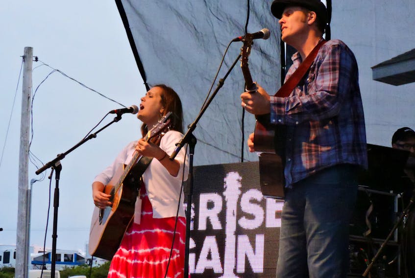 Maritime songwriters Jessica Rhaye and Dave Gunning perform together on the mainstage at the 2015 Stan Rogers Folk Festival. On Wednesday, organizers of the annual event that brings thousands of music fans to Canso each summer announced they were canceling the 2020 edition due to COVID-19 concerns.