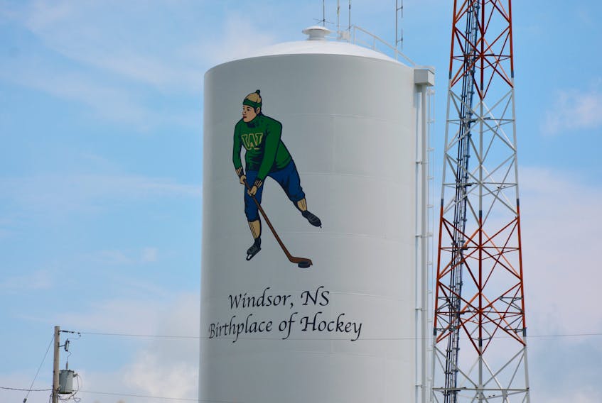 A water tower in the Windsor-West Hants Industrial Park with the Birthplace of Hockey phrase emblazoned on it.