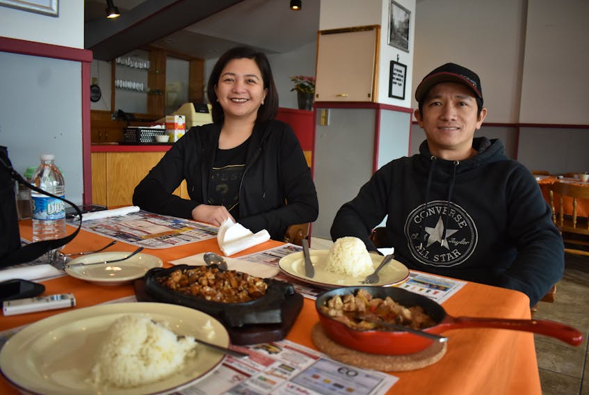 Jaclyn Molto, left, and Josh de Leon are co-owners of D’Theatre Resto and Bar in downtown North Sydney. The newly opened restaurant is offering Filipino and Canadian menu items.