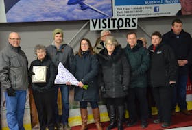 Over the years, Kensington has celebrated the contributions to the Kensington, P.E.I.-Bedford, Que., Peewee Friendship Hockey Exchange from delegates, players and community members who have passed way. The wives of the late Elmer Burt, the late Dave Martin and the late Dale Johnstone were presented with plaques recognizing their contributions during an on-ice ceremony at Community Gardens on Saturday night. From left: Gary Gallant, co-chair of the Kensington parents committee; Rona Burt and grandson Justin Burt; Rhonda MacEwen, co-chair of the Kensington parents committee; Jean Martin and son Nick Martin, and Hilda Johnstone.