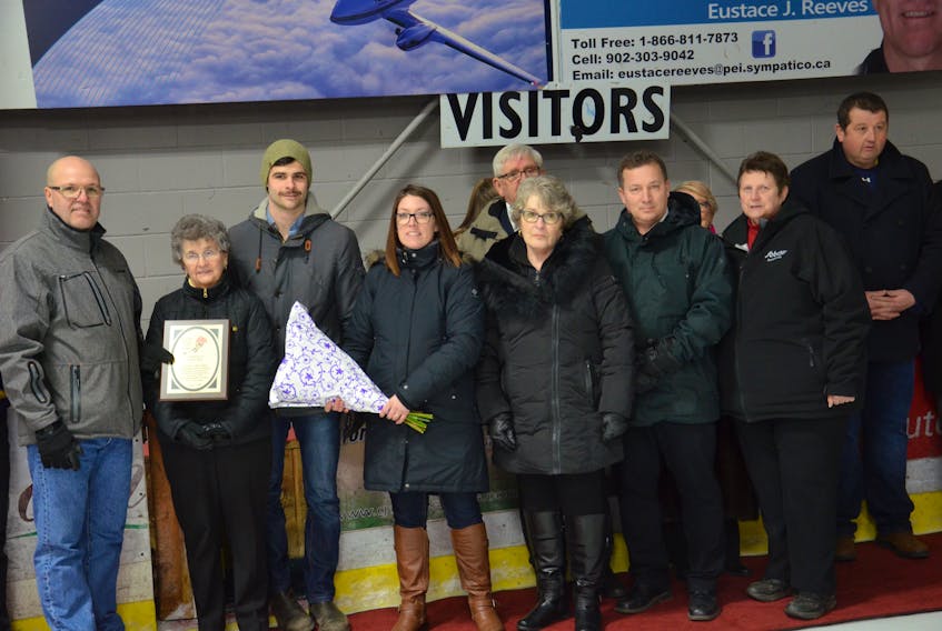 Over the years, Kensington has celebrated the contributions to the Kensington, P.E.I.-Bedford, Que., Peewee Friendship Hockey Exchange from delegates, players and community members who have passed way. The wives of the late Elmer Burt, the late Dave Martin and the late Dale Johnstone were presented with plaques recognizing their contributions during an on-ice ceremony at Community Gardens on Saturday night. From left: Gary Gallant, co-chair of the Kensington parents committee; Rona Burt and grandson Justin Burt; Rhonda MacEwen, co-chair of the Kensington parents committee; Jean Martin and son Nick Martin, and Hilda Johnstone.